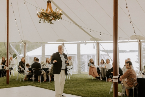 Symmetry Software creator Tom speaking at a company party.